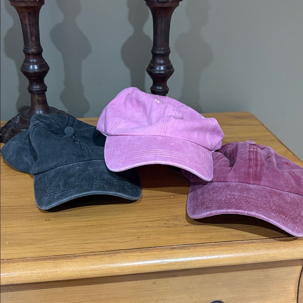 Set of Three Baseball Caps in Black, Pink, and Purple